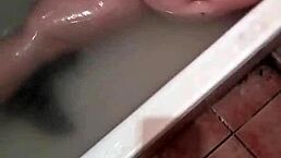 Bathtub Masturbation Leads to Couple's Shared Climax in Sheer