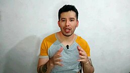 Young doctor interacts with mature boss in hospital cubicle.