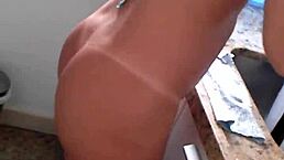 Amateur in Bikini Poses Seductively in the Kitchen