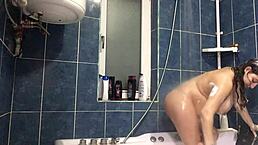 shower cleanup turns steamy with shaved milf showing natural tits. solo play hints at deeper desires.