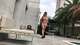 milf in sheer bikini at pool