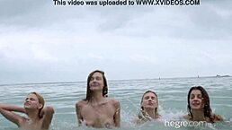 Four Beautiful Girls Nude On The Beach