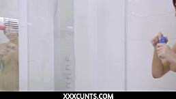 Emily Mayers, that tiny cutie, plays with a big dildo in the shower then gets her pussy pounded