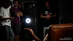 Busty milf gangbang with 5 strangers, gagging on cocks and cumshots.