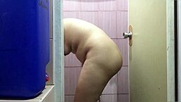 filipina girlfriend takes an early morning shower before heading to work.