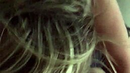 hot blonde with big tits casually plays with her lover's cock and gives a blowjob