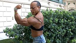 Tall Muscular Women Flex Their Biceps In Femdom Scene