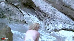 Horny mature blonde slut strips outdoors showing off small tits.