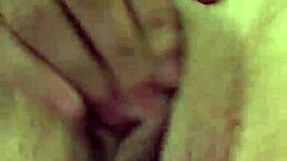 She teases her dry pussy lips with a buzzing vibrator