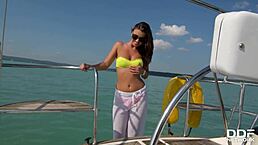 Sexy Vicky Love fingers horny pussy solo on yacht deck
