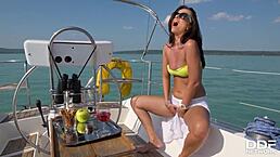 Sexy Vicky Love fingers horny pussy solo on yacht deck