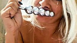 Amateur milf plays with ball dildo in her pussy?