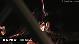 Blonde Gina Gerson feels intense pleasure in threesome at the campfire, with blowjobs and anal