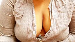 Asian MILF with sexy big boobs shows off her tits in casual setting