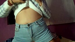 Beautiful girl undresses at home for a quick pussy touch thinking of handsome guy.