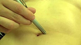 Fifi Foxx Teases with Belly Button and Natural Tits in Fetish Play