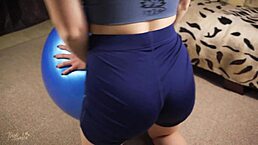 Tight yoga shorts on milf's butt bouncing hard on exercise ball