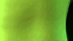 A young hitchhiker interacts with her driver in public outdoor setting