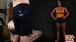 British femdom milf interacts with her man in a clothed setting.