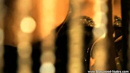 Indian milf seductress strips nude in a teasing dance routine