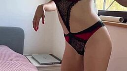 Skinny blonde masturbates openly by the window