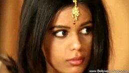 Beautiful indian brunette undresses while dancing nude, expressing love with clothes ripped