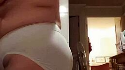 Wife flaunts big panties in kitchen solo show