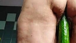 granny bbw slams hairy slit with cucumber in german style