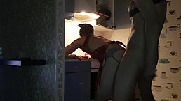 Asmodey and Jasper cook up dinner in the kitchen.