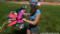 hey, that teen is rubbing her clit outdoors and sucking a popsicle