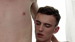 Horny twinks fuck bareback on the couch.