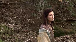 Girl teases her pussy outdoors in wild woods