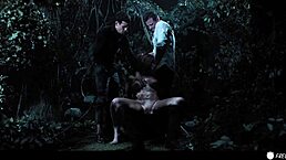 Busty chick with tattoos gets face fucked by three dudes in the forest