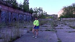 Curvy milf flaunts big ass under short skirt in public strip