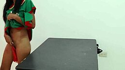 Stripping christmas suit while dancing sexy on desk?