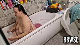 i caught this pervert spying on a bbw washing her huge floppy tits