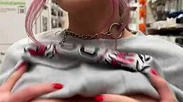 check out this busty babe flashing tits in the store!