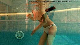 Petite teen irina russaka shows tight pussy and small tits underwater in pool.