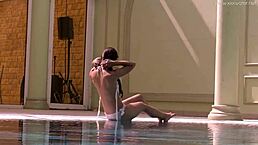 Petite teen irina russaka shows tight pussy and small tits underwater in pool.