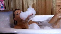 Sexy Vicky Vette pleasures herself with shower head solo