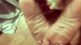 Detailed Close-Up Of Ass And Feet In Erotic Pose