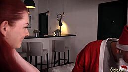 Santa fucks that naughty redhead's tight pussy for Christmas – what a wild treat!
