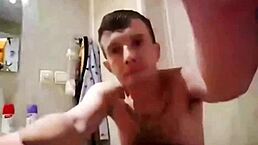 Giving blowjob to redhead girlfriend in bathroom