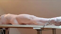 Amateur slave tied on table for rough play in 2021. Candles and humiliation added to the mix.