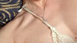 Worshiping her armpits in the bedroom with lipstick and braces