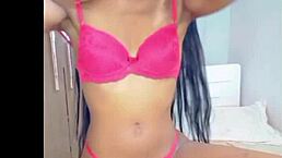 The slim girl indulges in sensual masturbation alone