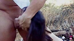 does muscular guy penetrate black girl's tight cunt in forest?