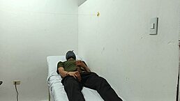 Kinky doctor masturbates his cock in the office