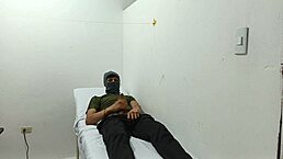 Kinky doctor masturbates his cock in the office