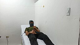 Kinky doctor masturbates his cock in the office